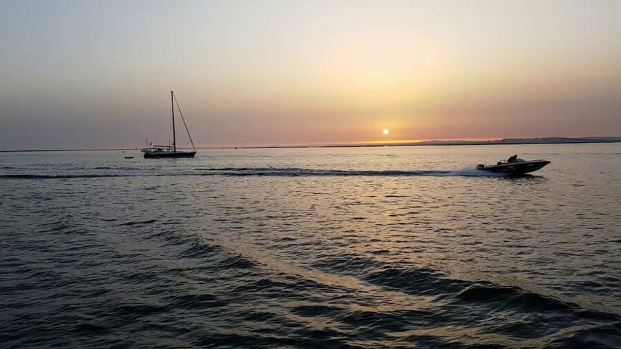 Faro: Ria Formosa Guided Sunset Tour by Catamaran - Guided views through Parque Natural da Ria Formosa