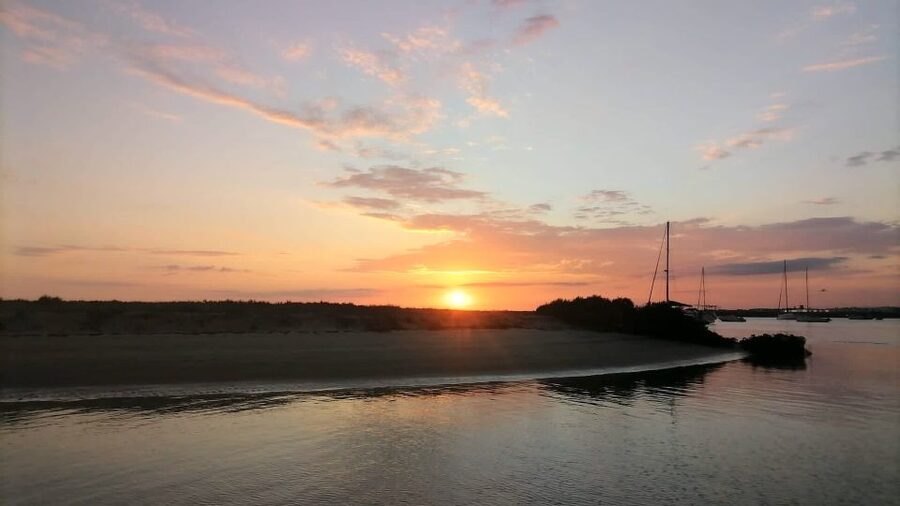 Faro: Ria Formosa Guided Sunset Tour by Catamaran - The return ride and total timing