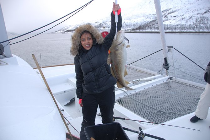 Fishing Trip with Luxury Catamaran in Tromso - The catamaran, the saloon, and staying warm