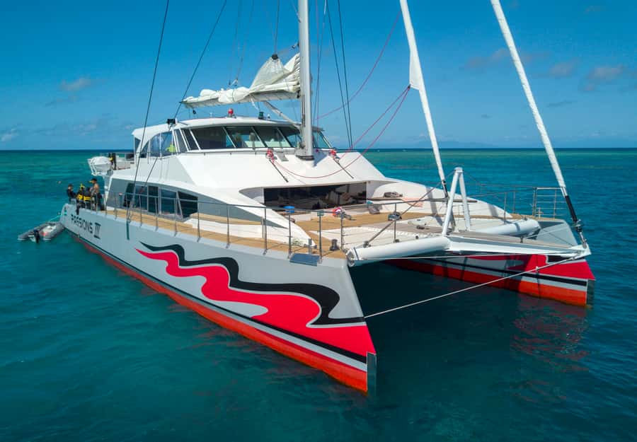 From Cairns: Great Barrier Reef Cruise by Premium Catamaran - Leaving Cairns on a spacious catamaran
