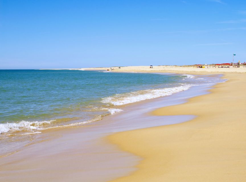 From Faro: 4 Stops, 3 Islands in Ria Formosa Catamaran Tour - Hangares: seeing the Ria Formosa at work