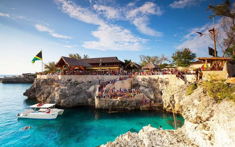 From Montego Bay/Falmouth: Negril Beach Catamaran Cruise - Boarding the catamaran along Negril’s coast