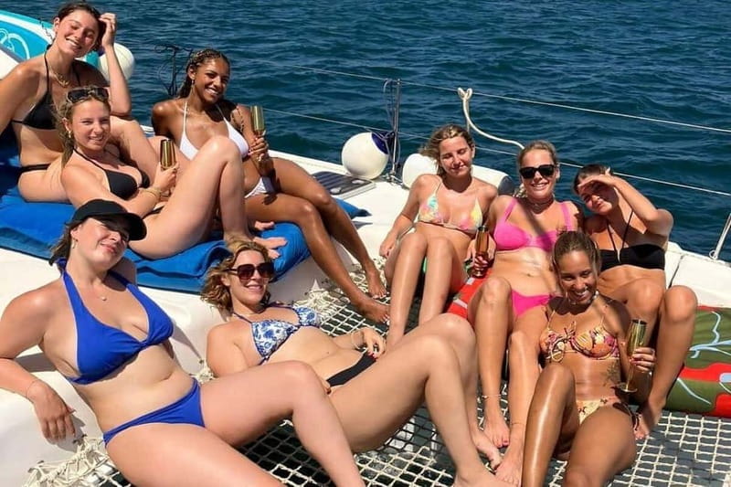 From Palma: Luxury Catamaran Group Tour with Tapas & Drinks - Tapas, drinks, and the onboard rhythm
