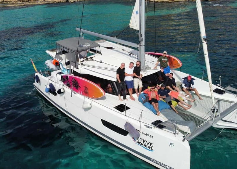 From Palma: Luxury Catamaran Group Tour with Tapas & Drinks - What $117 buys you