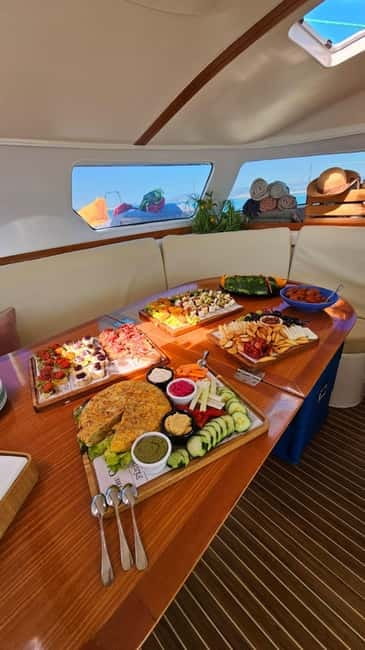 From Palma: Luxury Catamaran Group Tour with Tapas & Drinks - Daytime or evening sailing