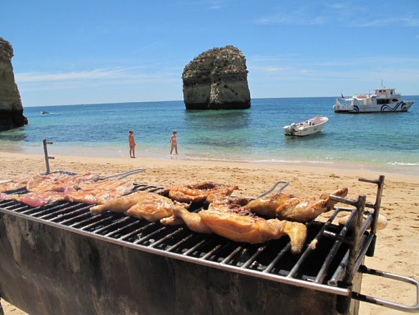 From Portimão: Catamaran Cruise to Benagil Caves with BBQ - Reaching Benagil by catamaran and dinghy
