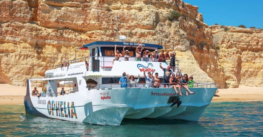 From Portimão: Catamaran Cruise to Benagil Caves with BBQ - Sailing past Ferragudo and its castle
