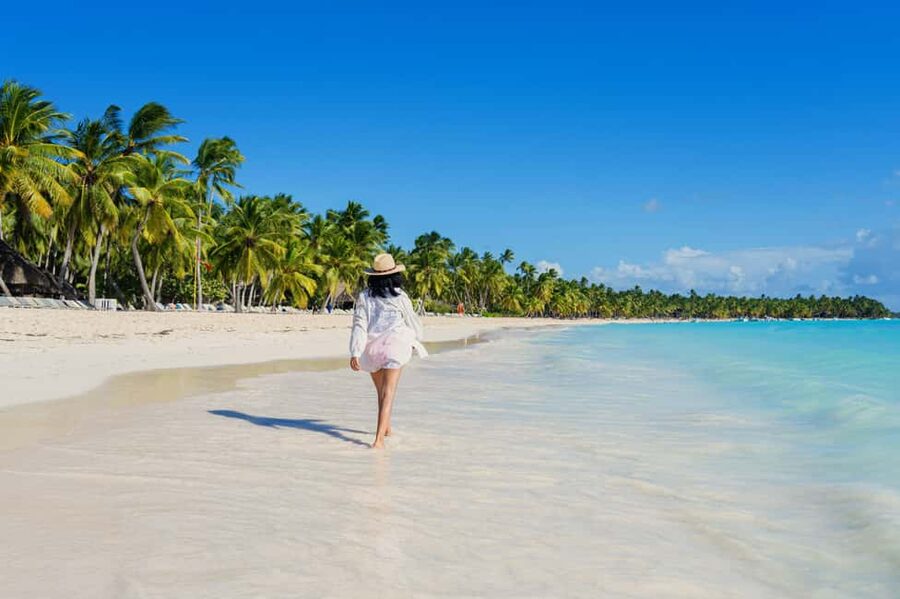 From Punta Cana: Catamaran Tour to Saona Island with Open Bar and Buffet - Sailing toward Saona with music and an open bar