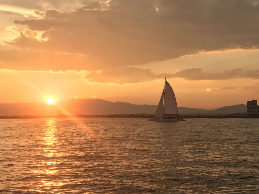 From Roses: Sunset Catamaran Cruise - Watching Roses change from day to night