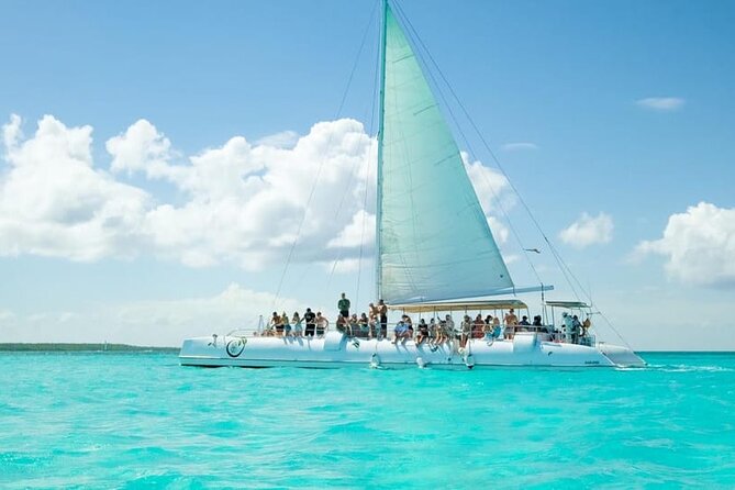 From Santo Domingo Saona Island Food And Drink Catamaran Vip - Meeting at Parque Colón before sunrise