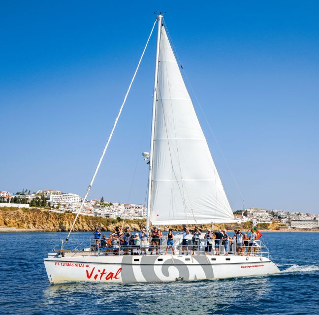 From Vilamoura: Sunset Catamaran Experience - Swimming, Music, and the Bar