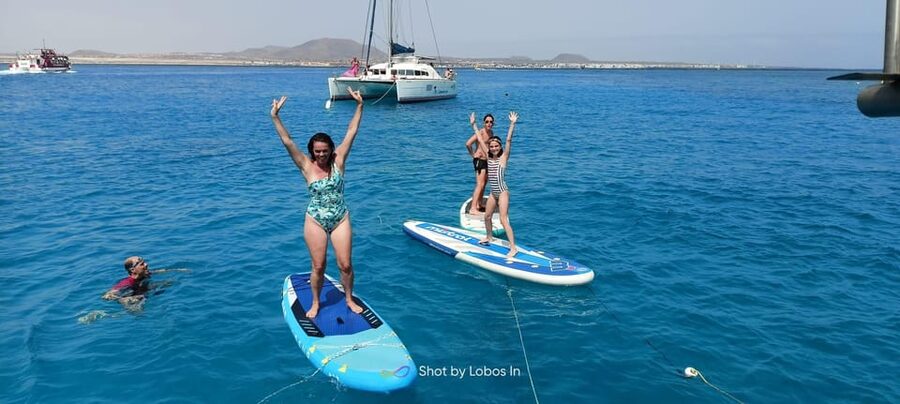 Fuerteventura: PRIVATE Catamaran All Inclusive Lobos in - Paddle boards, snorkeling, and time in the sea