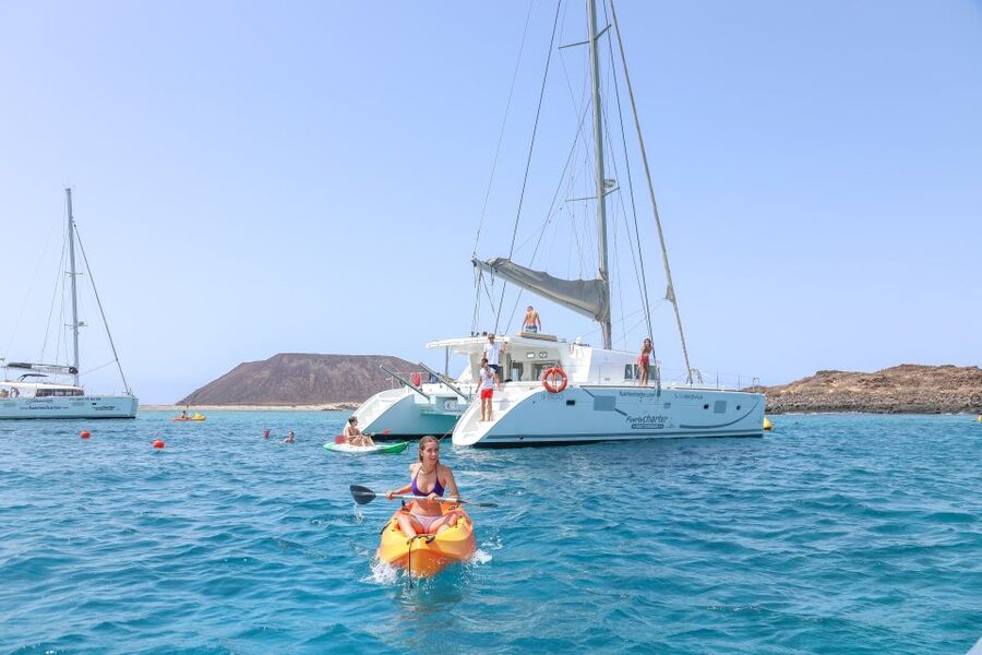 Fuerteventura: Private Luxury Catamaran to Lobo Island - Lighthouse, fishermen’s houses, and the island from the sea