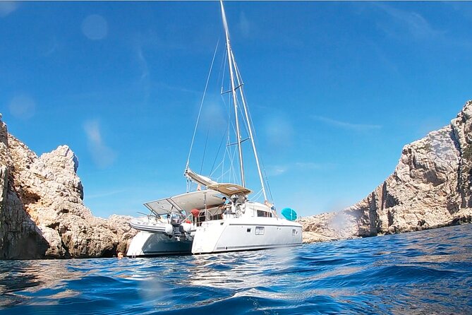 Full day catamaran tour in Alghero - Lunch with local products aboard the catamaran