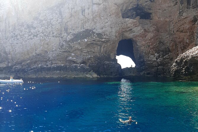 Full day catamaran tour in Alghero - First swim near Capo Galera