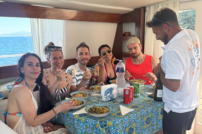 Full-day catamaran tour in Palermo: boat experience with lunch - Lunch, Drinks, Music, and the Social Side