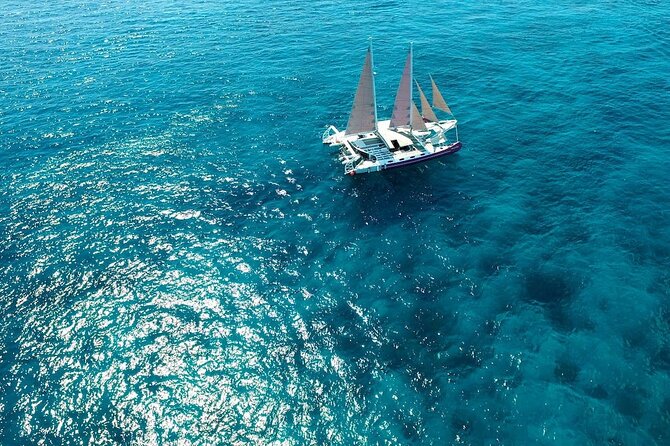 Full day Lembongan Island Catamaran Cruise with BBQ Lunch - Sailing from Seminyak toward Nusa Lembongan