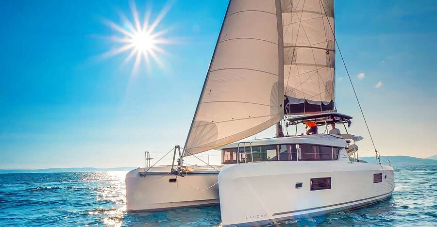 Funchal Bay: Dolphin & Whale Watch Luxury Catamaran Cruise - Cabo Girão brings a swim break