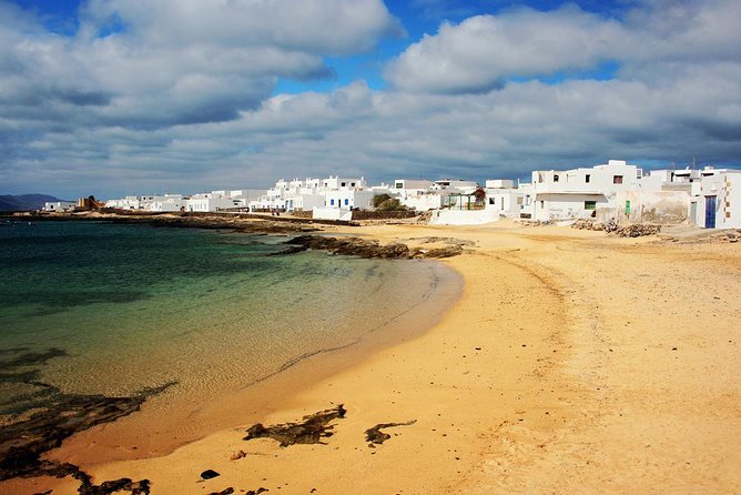 Graciosa Marine Reserve Catamaran Day Trip with Transfers - Paella lunch, drinks, and the value of the fare