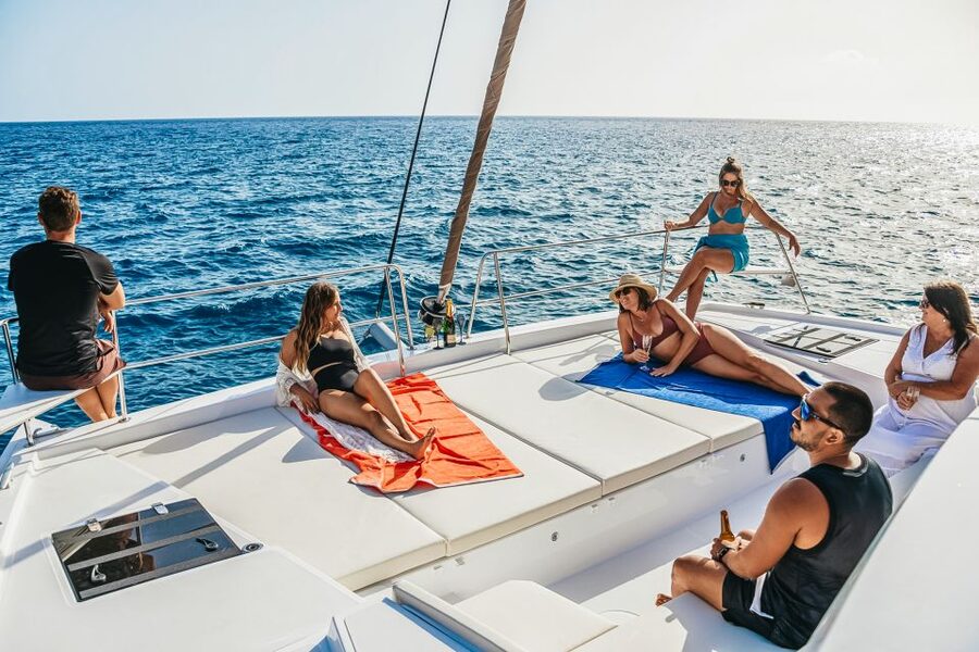 Gran Canaria: Catamaran Day Trip with Food and Drinks - First stop: swimming, snorkeling, SUP, and kayaking