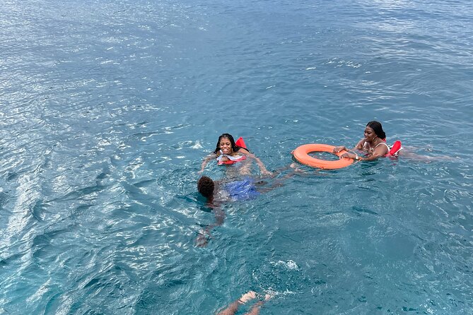 Half Day Catamaran Party Boat, Snorkeling and Hip Strip Tour - Swimming and snorkeling in Montego Bay Marine Park