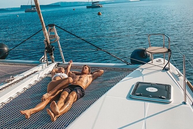 Half-Day Exclusive Catamaran Cruise in Santorini with Meal and Open Bar - Why a catamaran is a smart way to see Santorini