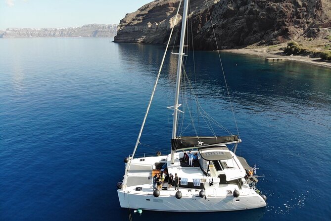 Half-Day Exclusive Catamaran Cruise in Santorini with Meal and Open Bar - Hotel pickup makes the marina easy