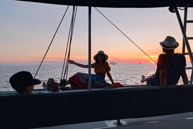 Half-Day Exclusive Catamaran Cruise in Santorini with Meal and Open Bar - Day cruise or sunset cruise?