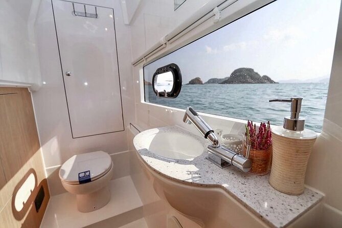 Half Day Luxury Catamaran Turtle Snorkel And Beach - From active snorkeling to a relaxed beach stop