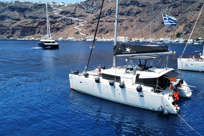 Half Day Premium Catamaran Cruise in Santorini including Oia - Santorini from the water, not just the cliff path