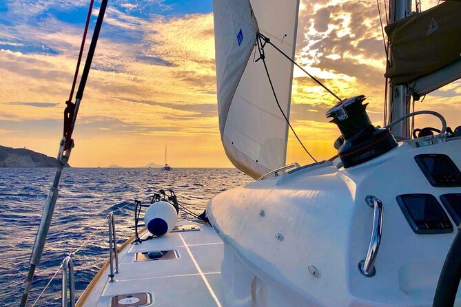 Half Day Premium Catamaran Cruise in Santorini including Oia - Limestone formations and clear water
