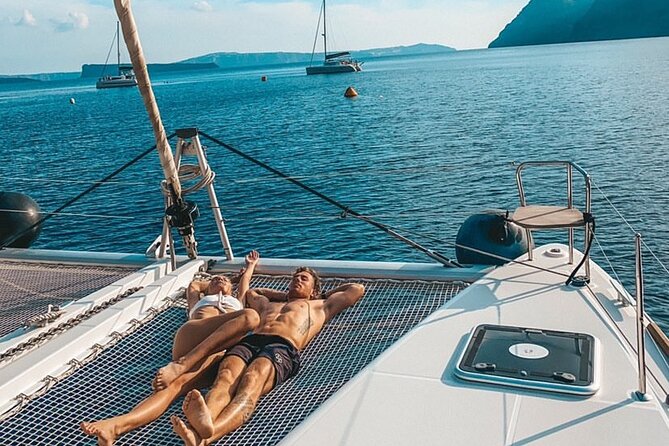 Half Day Premium Catamaran Cruise in Santorini including Oia - Oia and the Venetian lighthouse by boat
