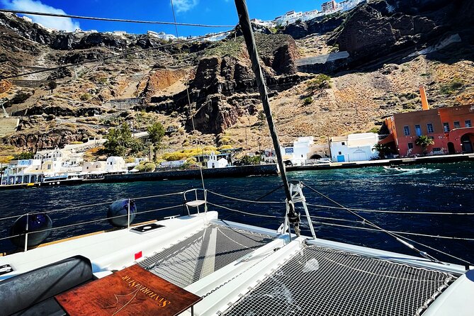 Half Day Premium Catamaran Cruise in Santorini including Oia - What the $193.49 price includes in practical terms