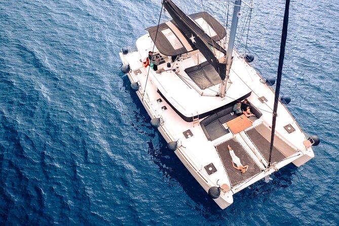 Half Day Premium Catamaran Cruise in Santorini including Oia - Red Beach starts the swimming schedule