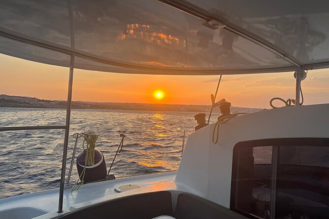 Half Day Sailing Catamaran with Sunset Experience - Sunset in Front of Rhodes Town