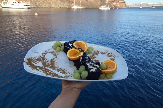 Half-Day Tailor-made Private Catamaran Cruise in Santorini - Red Beach: a quick look at Santorini’s red cliffs