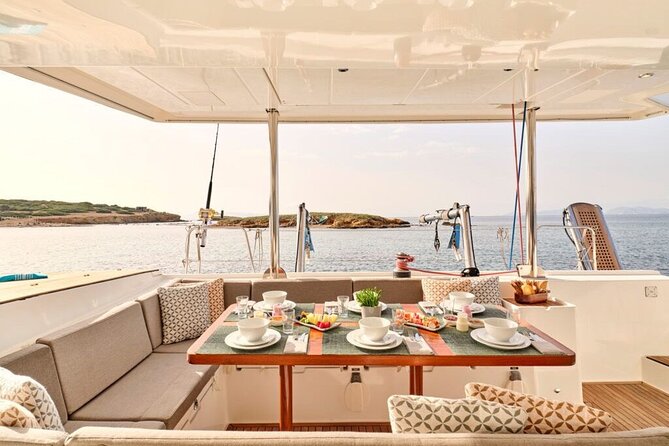 Heraklion: Sunset Dia Catamaran Cruise by Top-50 Greek Chef - Swimming, snorkeling, and the private floating pool
