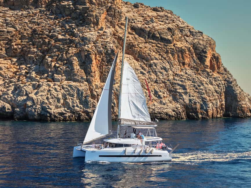 Hersonissos: Dia Catamaran Cruise with Lunch & Drinks - Arriving at protected Dia Island