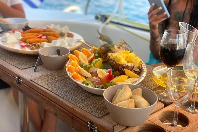 Hersonissos: Luxury Sunset Catamaran Cruise Sushi & Open Bar - Sunset Above Agios Georgios Sarantaris