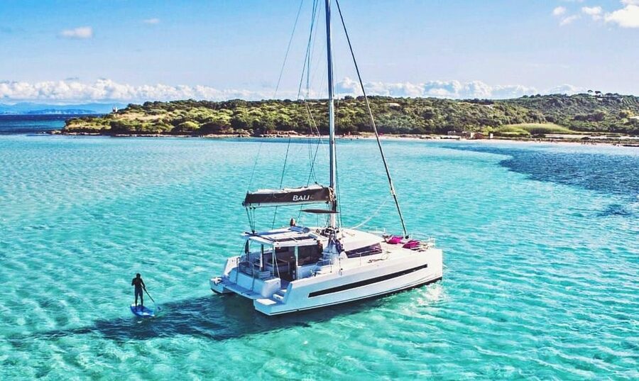 Hersonissos: Private Catamaran Cruise, Dia Island with Lunch - Leaving Hersonissos on a private catamaran