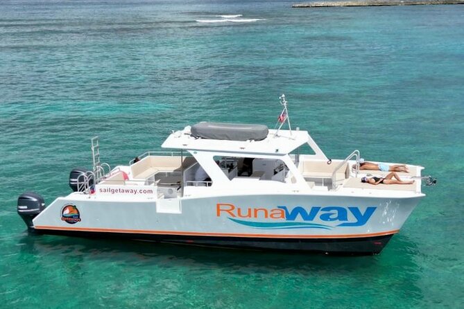 Icacos Double Dip Power Catamaran Snorkel & Beach Tour - Lunch, rum drinks, and a pause in the action