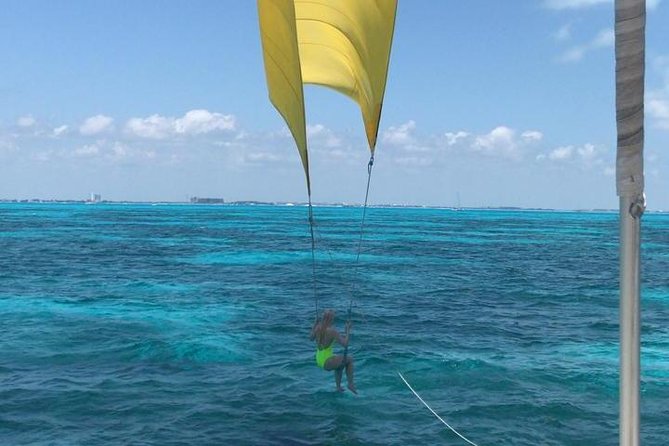 Isla Mujeres adventure by Catamaran. Snorkel, open bar and lunch - The brief snorkeling stop and underwater statues