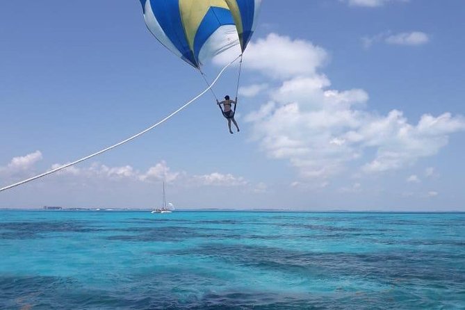 Isla Mujeres adventure by Catamaran. Snorkel, open bar and lunch - The beach club, buffet lunch, and open bar