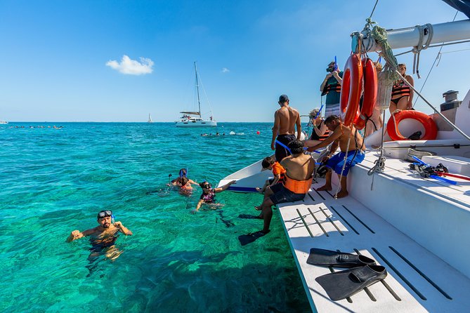 Isla Mujeres Catamaran, Open Bar & Optional Buffet and pick up - Beach club time, buffet lunch, and package fine print