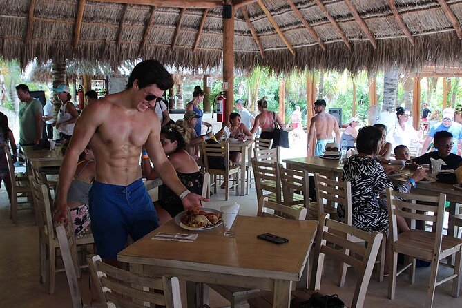 Isla Mujeres Catamaran Plus! Drinks, Snorkel & Beach Club - Beach club lunch and time by the water