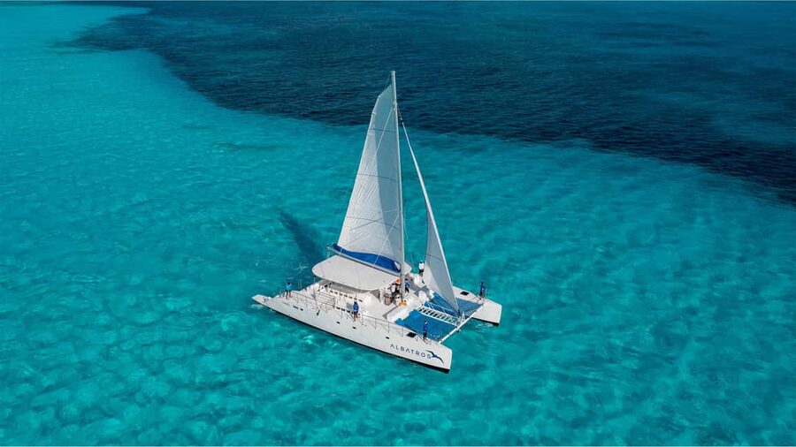 Isla Mujeres Catamaran, Snorkel & Buffet Lunch - The catamaran ride turns into a floating party