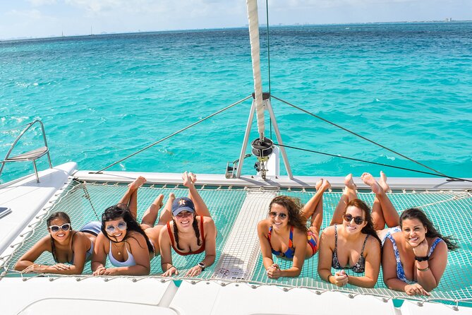 Isla Mujeres Catamaran Tour with Snorkel, Open bar and Transport - El Meco reef is exciting when the sea cooperates