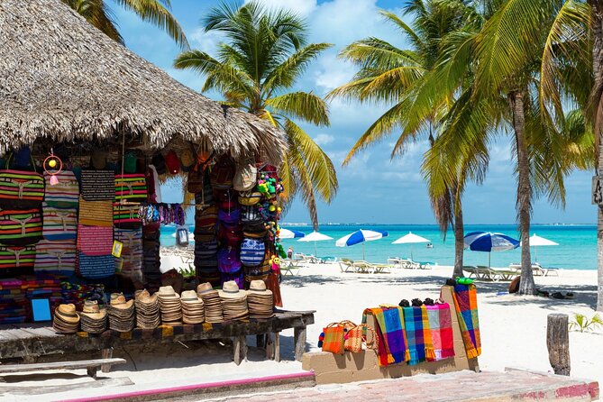 Isla Mujeres Catamaran Tour with Snorkel, Open bar and Transport - Isla Mujeres gives you a short taste of island life