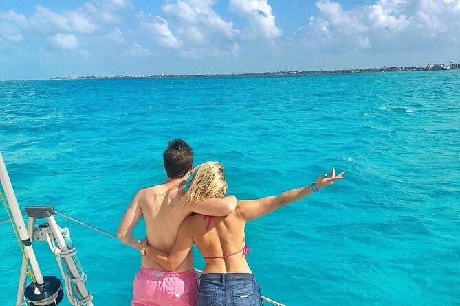 Isla Mujeres Catamaran Tour with Snorkel, Open bar and Transport - The return sail is scenic and social