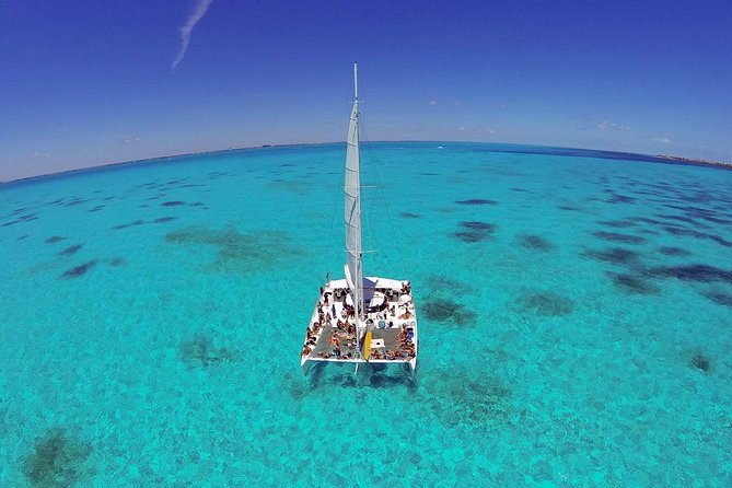 Isla Mujeres Catamaran Tour with Snorkeling at MUSA, Buffet Lunch & Open Bar - Snorkeling among the statues at MUSA
